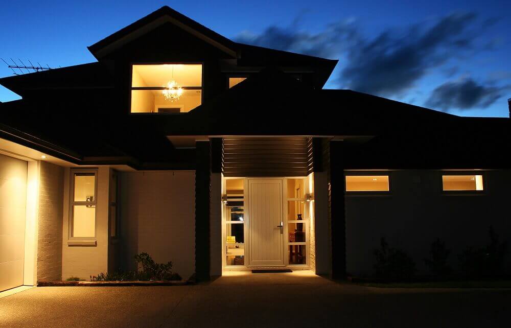Secure two storey house at night